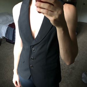 Black button up vest